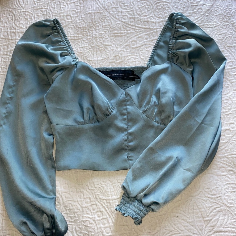 light blue silk blouse